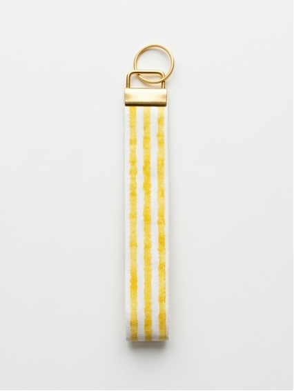 Handmade Seaside Goldenrod key fob with clean yellow and white stripes and gold hardware