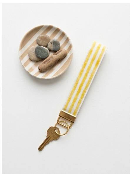 Handmade Seaside Goldenrod key fob with clean yellow and white stripes and gold hardware