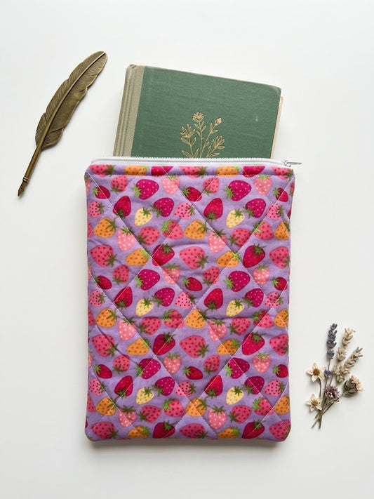 Purple book pouch with strawberry pattern on a white background
